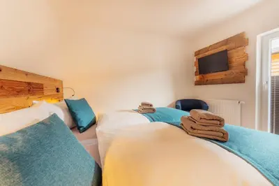 Ein Bett oder Betten in einem Zimmer der Unterkunft Wasserregal