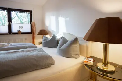 Ein Bett oder Betten in einem Zimmer der Unterkunft Bismarckstraße 27