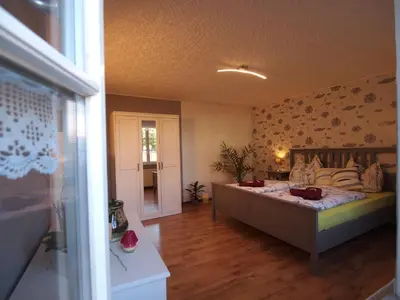 Ein Bett oder Betten in einem Zimmer der Unterkunft Quedlinburger Fachwerkhaus