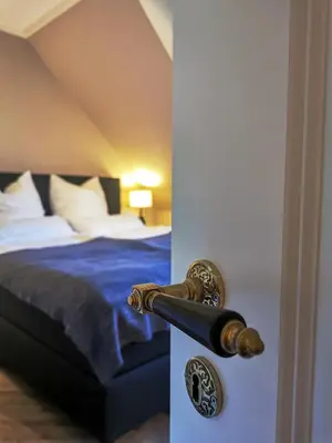 Ein Bett oder Betten in einem Zimmer der Unterkunft Ferienwohnung Gipfelstürmer