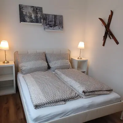 Ein Bett oder Betten in einem Zimmer der Unterkunft Wanderfreude