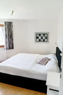 Ein Bett oder Betten in einem Zimmer der Unterkunft Bocksbergblick Fewo BB 02
