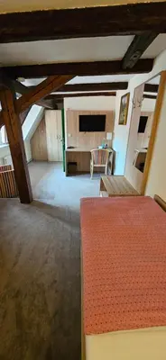 Ein Bett oder Betten in einem Zimmer der Unterkunft Hotel Zum Schloss