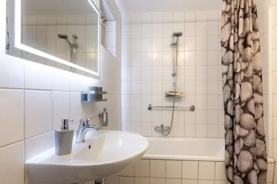 Ein Badezimmer in der Unterkunft Ferienwohnung zum rost'gen Potte I
