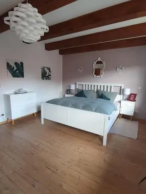 Ein Bett oder Betten in einem Zimmer der Unterkunft Domizil an der Huysburg