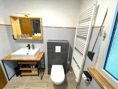 Ein Badezimmer in der Unterkunft Vor lauter Bäumen B&B