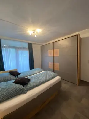 Ein Bett oder Betten in einem Zimmer der Unterkunft International 5