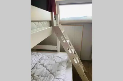 Ein Bett oder Betten in einem Zimmer der Unterkunft Schönes ruhiges App mit Panoramablick auf den Harz