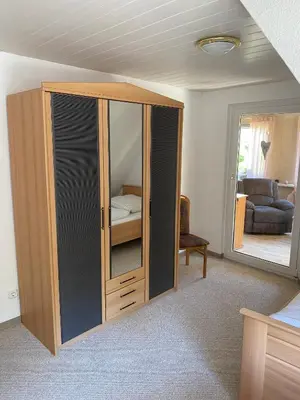 Ein Bett oder Betten in einem Zimmer der Unterkunft Ferienwohnung Meilerplatz – Familienfreundliche Ferienwohnung für max. 4 Personen in Bad Lauterberg am Harz
