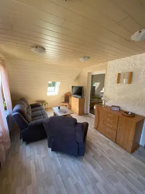 Ein Sitzbereich in der Unterkunft Ferienwohnung Meilerplatz – Familienfreundliche Ferienwohnung für max. 4 Personen in Bad Lauterberg am Harz