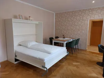 Ein Bett oder Betten in einem Zimmer der Unterkunft Ferienwohnung ,,Zum Kaiser''