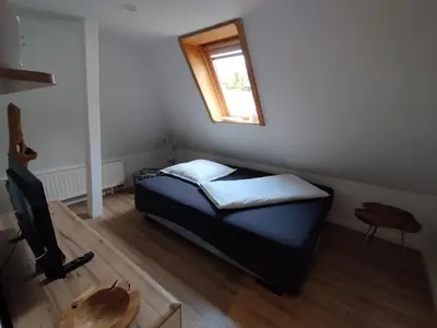 Ein Bett oder Betten in einem Zimmer der Unterkunft Ferienwohnung Lehmann - Wernigerode