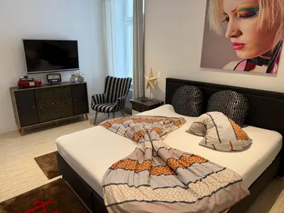 Ein Bett oder Betten in einem Zimmer der Unterkunft Ferienwohnung Roman Stadtkern von Quedlinburg 80qm