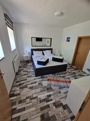 Ein Bett oder Betten in einem Zimmer der Unterkunft Fewo am Reiterhof