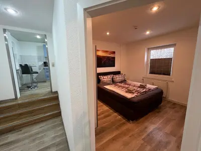 Ein Bett oder Betten in einem Zimmer der Unterkunft FEWO an der Malzmühle 1d
