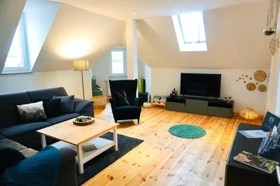 Ein Sitzbereich in der Unterkunft FeWo26 im Sagenharz - stilvolles Family-Apartment, 2 SZ, Klimaanlage, WLAN, Netflix & Free Parking