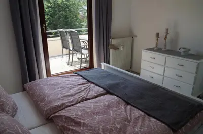 Ein Bett oder Betten in einem Zimmer der Unterkunft Ferienwohnung Lechsner