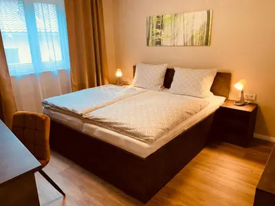 Ein Bett oder Betten in einem Zimmer der Unterkunft Ferienhaus Hinz