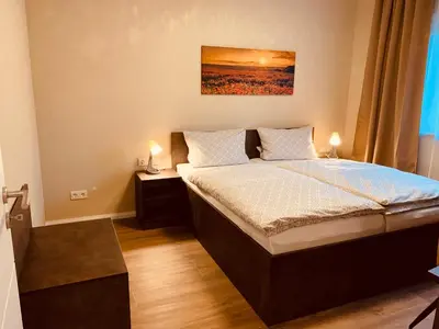 Ein Bett oder Betten in einem Zimmer der Unterkunft Ferienhaus Hinz