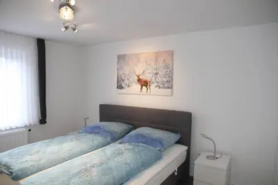 Ein Bett oder Betten in einem Zimmer der Unterkunft Wohnung Julius 2