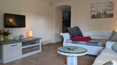 Ein Sitzbereich in der Unterkunft WeisseVilla Friedrichsbrunn Fewo SOLIDE