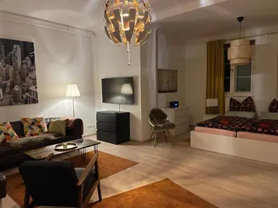 Ein Sitzbereich in der Unterkunft Großzügige Souterrainwohnung in historischer Stadtvilla im Herzen Zellerfelds
