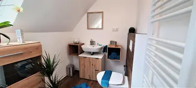 Ein Bett oder Betten in einem Zimmer der Unterkunft Ferienhaus Heider II