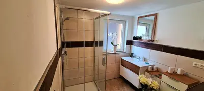 Ein Badezimmer in der Unterkunft Ferienhaus Heider II