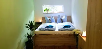 Ein Bett oder Betten in einem Zimmer der Unterkunft Ferienhaus Heider II