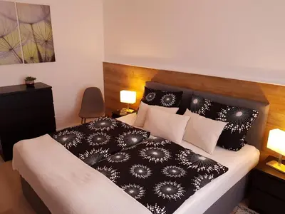 Ein Bett oder Betten in einem Zimmer der Unterkunft Ferienwohnung Quedlinburg