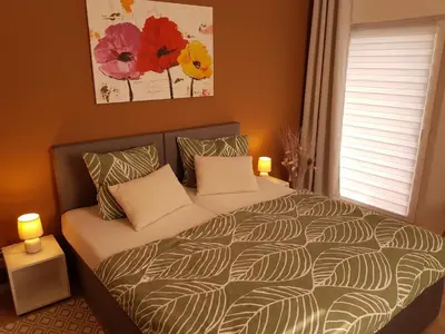 Ein Bett oder Betten in einem Zimmer der Unterkunft Ferienwohnung Quedlinburg