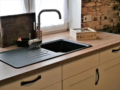 Küche/Küchenzeile in der Unterkunft FeWo Fuchsbau mit Dampfdusche #Kamin#Innenstadtnähe#Netflix von Harztraveler