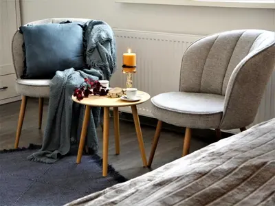 Ein Sitzbereich in der Unterkunft FeWo Fuchsbau mit Dampfdusche #Kamin#Innenstadtnähe#Netflix von Harztraveler