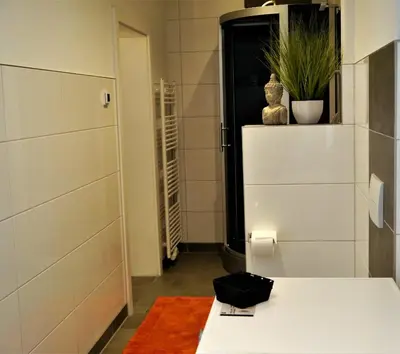 Ein Bett oder Betten in einem Zimmer der Unterkunft FeWo Fuchsbau mit Dampfdusche #Kamin#Innenstadtnähe#Netflix von Harztraveler