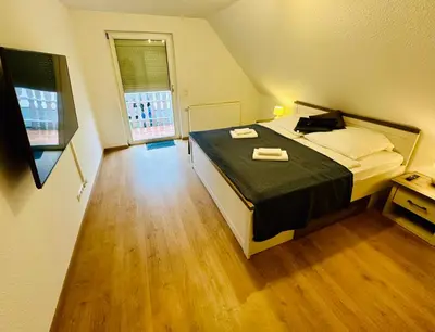 Ein Bett oder Betten in einem Zimmer der Unterkunft Haus Brockenblick #Garten #ruhige Lage #PS 5 #Netflix von Harztraveler