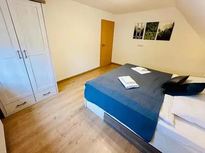 Ein Bett oder Betten in einem Zimmer der Unterkunft Haus Brockenblick #Garten #ruhige Lage #PS 5 #Netflix von Harztraveler