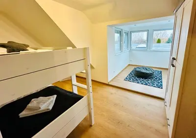 Ein Bett oder Betten in einem Zimmer der Unterkunft Haus Brockenblick #Garten #ruhige Lage #PS 5 #Netflix von Harztraveler