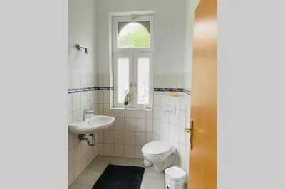 Ein Badezimmer in der Unterkunft TraumFeWo Palais #Innenstadt #Garten #Netflix von Harztraveler