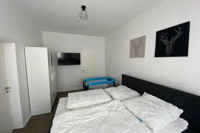 Ein Bett oder Betten in einem Zimmer der Unterkunft Ferienwohnung im Harz