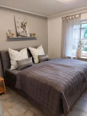 Ein Bett oder Betten in einem Zimmer der Unterkunft Bunte Stube