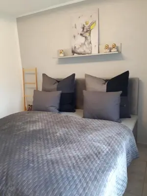 Ein Bett oder Betten in einem Zimmer der Unterkunft Bunte Stube