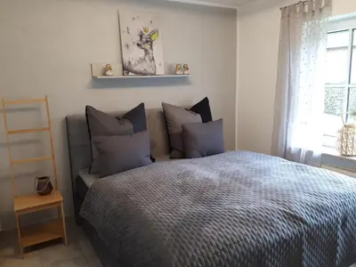 Ein Bett oder Betten in einem Zimmer der Unterkunft Bunte Stube