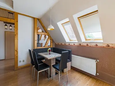 Ein Sitzbereich in der Unterkunft gemütliche Ferienwohnung in Cattenstedt