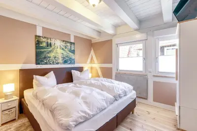 Ein Bett oder Betten in einem Zimmer der Unterkunft Fachwerkhaus auf dem Schlossberg