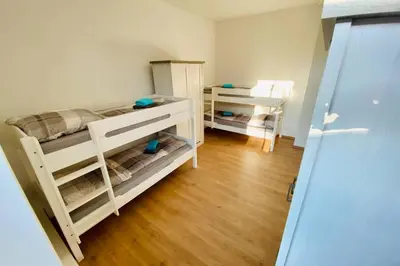 Ein Bett oder Betten in einem Zimmer der Unterkunft FeWo Seestadt mit Balkon #Netflix #Seenähe #Einkaufen von Harztraveler