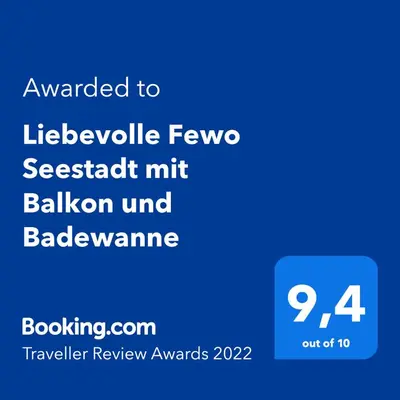 Ein Zertifikat, Auszeichnung, Logo oder anderes Dokument, das in der Unterkunft FeWo Seestadt mit Balkon #Netflix #Seenähe #Einkaufen von Harztraveler ausgestellt ist