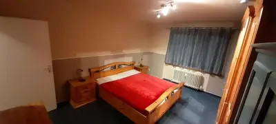 Ein Bett oder Betten in einem Zimmer der Unterkunft Ferienwohnung Kück-Theodor-Hein-Str.