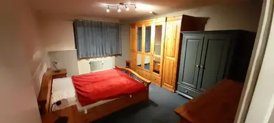 Ein Bett oder Betten in einem Zimmer der Unterkunft Ferienwohnung Kück-Theodor-Hein-Str.