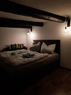 Ein Bett oder Betten in einem Zimmer der Unterkunft Kaufmannshof mit Fachwerkcharme