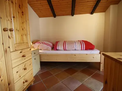 Ein Bett oder Betten in einem Zimmer der Unterkunft Ferienwohnung im Haus Schiefertal, Wieda